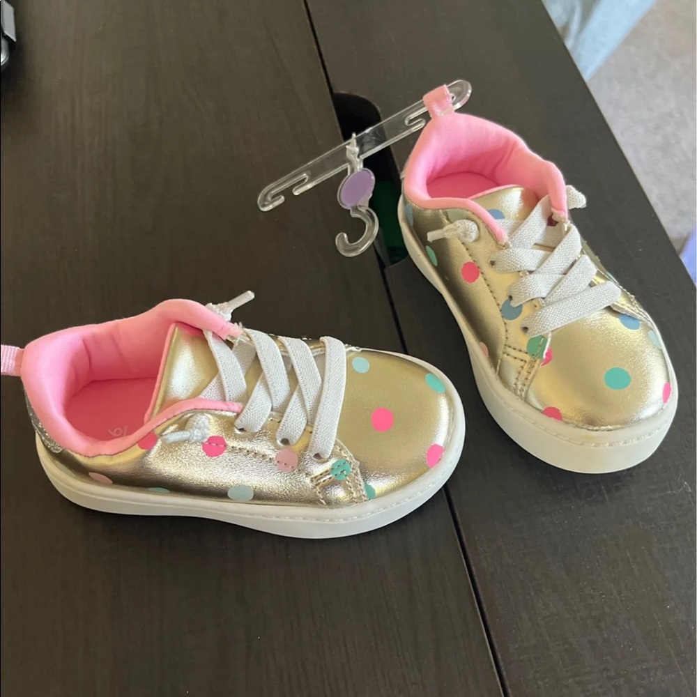 NWT Toddler gold sneakers. Carters sz 6